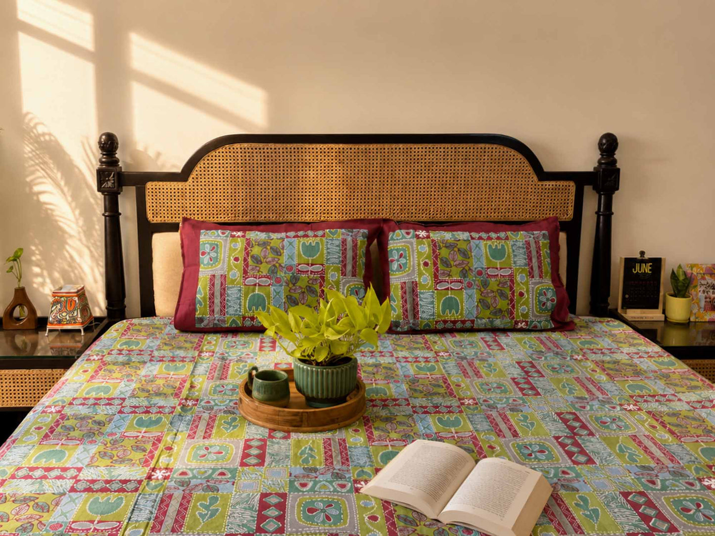 Traditional patchwork bed cover with vibrant handcrafted patterns